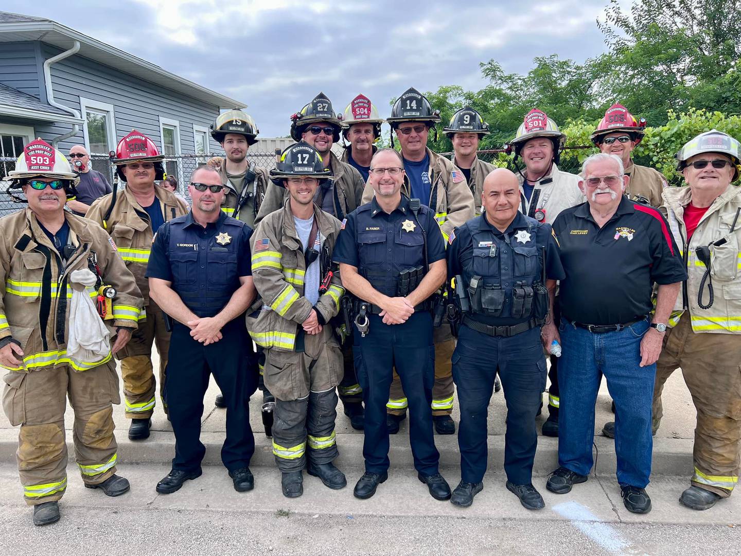 Marseilles Mayor Jim Hollenbeck (far right) donated $10 for every first responder who participated Saturday, July 9, 2022, in the Dr. Sutton Memorial Bridge Walk. Proceeds were given to the Marseilles Nursing Service.