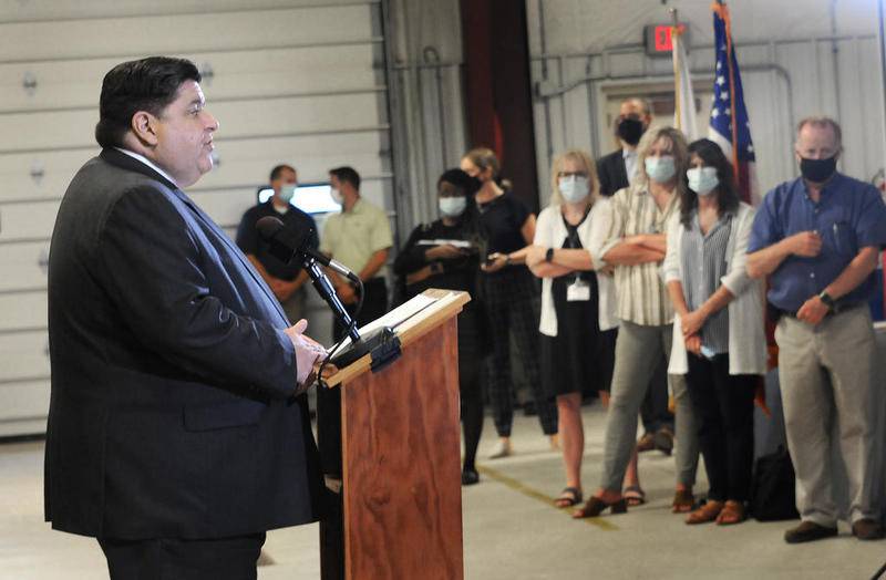 Gov. JB Pritzker addresses the rising rates of COVID-19 in the LaSalle County area Thursday at the LaSalle County Emergency Management Agency.