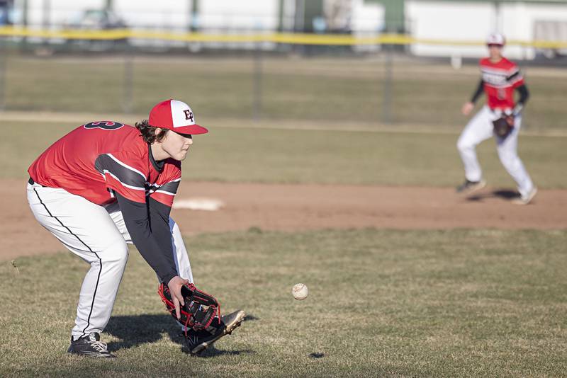 Erie-Prophetstown’s Camden Collis fields a ball against Rock Falls Monday, March 27, 2023.