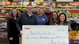 Peru Hy-Vee raises $4,308 for local food pantries