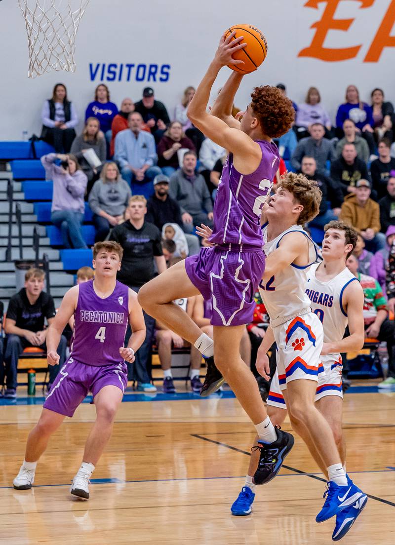 Pecatonica's Joshua Jennings puts up a floater on Eastland's Braden Anderson on Thursday, Dec. 19, 2024 at Eastland High School.