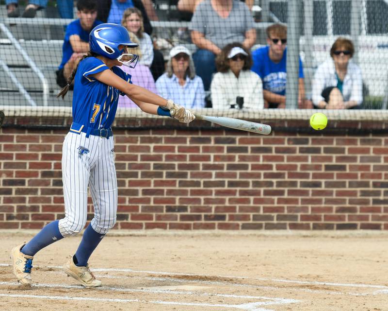 Wheaton North's Hana Stoner (7) makes contact with the ball for a base hit during the sectional semifinal game on Thursday June 5, 2025, while taking on Wheaton Warrenville South held at Oswego High School.