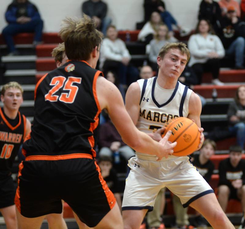 Polo's Gage Zeigler (3) rebounds against Warren on Tuesday, Dec. 17, 2024 at the 63rd Annual Forreston Holiday Tournament.