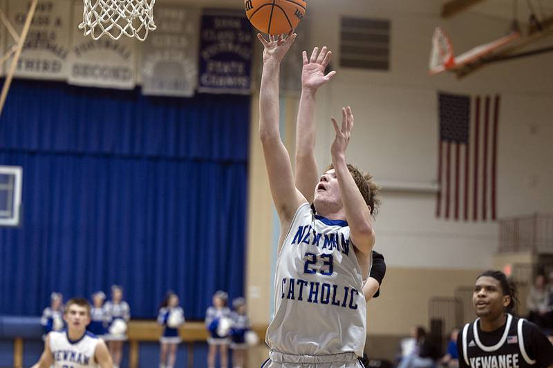Newman’s John Rozwee puts up a shot against Kewanee Friday, Jan. 10, 2025.