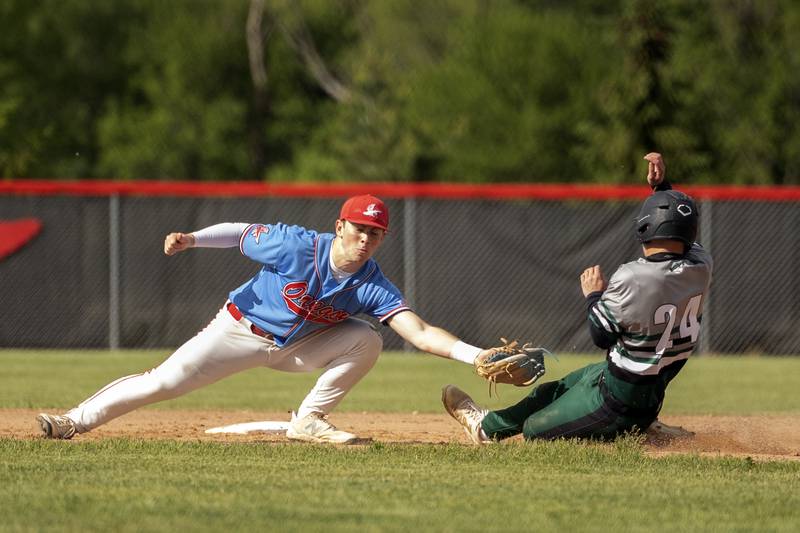 Oregon’s Keaton Salsbury tags out Rock Falls’ Owen Mandrell in the Stillman Valley Class 2A Regional semifinal Thursday, May 22, 2025.