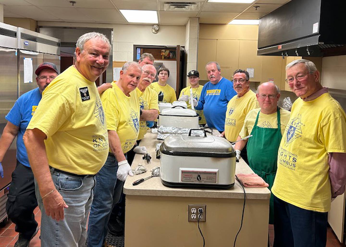 Volunteers with the Knights of Columbus prepare turkey meals for around 150 seniors at the Beecher Center in Yorkville on Nov. 18, 2025.