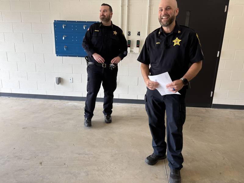 Police Chief Matt Mannino, left, and Sgt. Chad Riffe show the sally port at the Lake in the Hills Police Department Wednesday, May, 20, 2026.