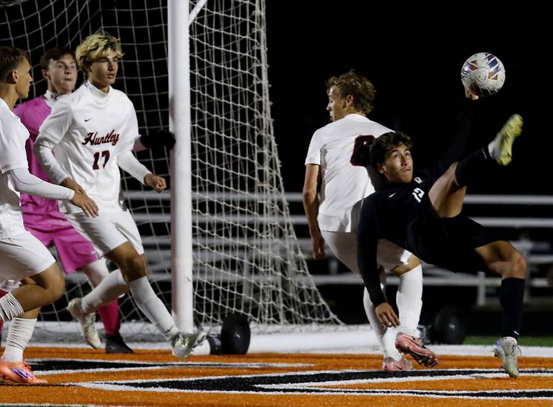 McHenry's Emmanuel Navarrete kicks the ball towards the goal during a Fox Valley Conference boys soccer match against Huntley on Thursday, Oct. 9, 2025, at McCracken Field in McHenry.