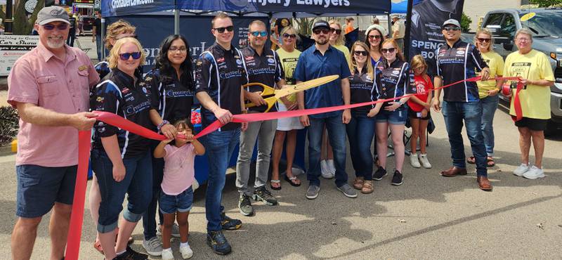The Genoa Area Chamber of Commerce welcoming Cronauer Law with a ribbon-cutting