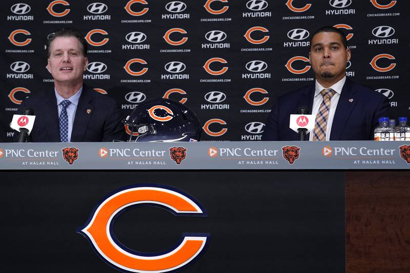 Chicago Bears head coach Matt Eberflus, left, and general manager Ryan Poles listen to a question during a news conference, Monday, Jan. 31, 2022, at Halas Hall in Lake Forest.