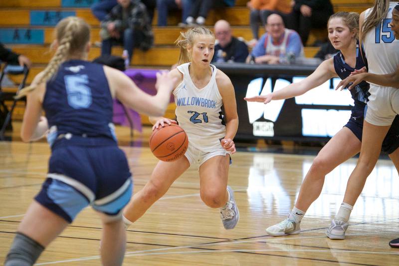 Willowbrook's Nina Nytko splits the defense by Downers Grove South on Friday, Feb.3,2023 in Villa Park.