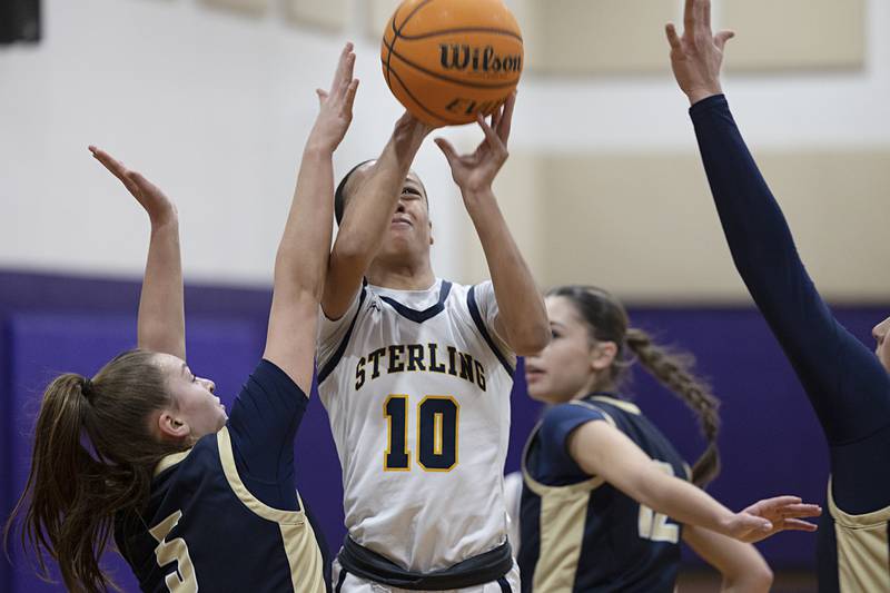 Sterling’s Nia Harris puts up a shot against Rockford Christian Friday, Dec. 26, 2025, at the Duchesses Basketball Christmas Classic.