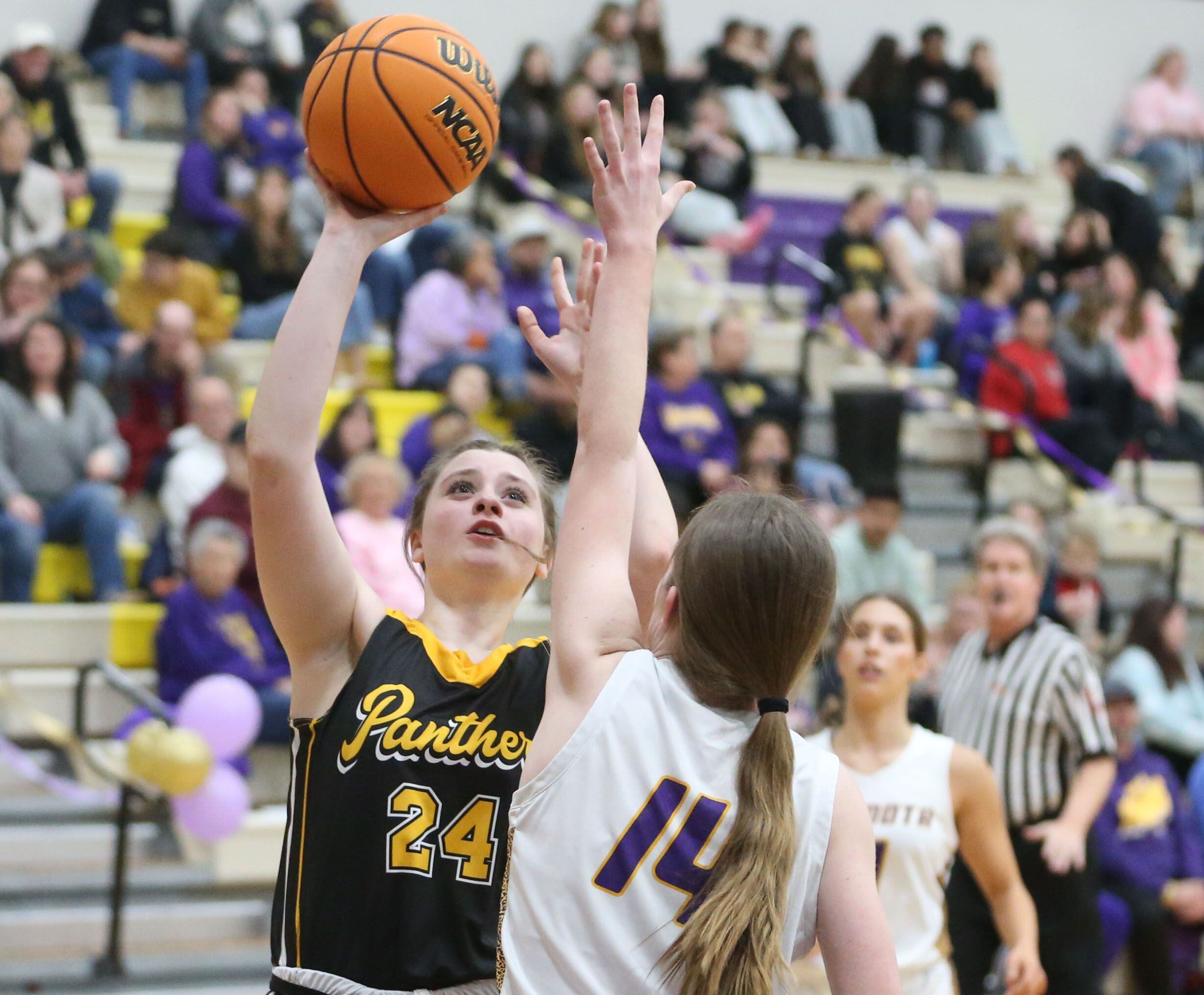 Putnam County's Cadence Breckenridge takes a shot over Mendota'a Laylie Denault on Tuesday, Feb. 10, 2026 at Mendota High School.