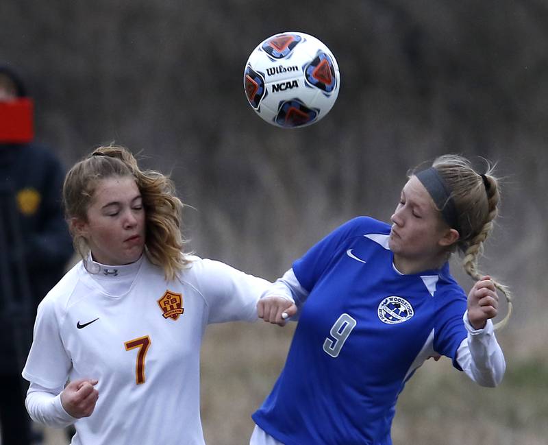 Richmond-Burton's Rachel Mendlik and Woodstock's Madeline Day battle for the ball during a Kishwaukee River Conference soccer match Wednesday, April 30, 2022, between Richmond-Burton and Woodstock at Creekside Middle School.