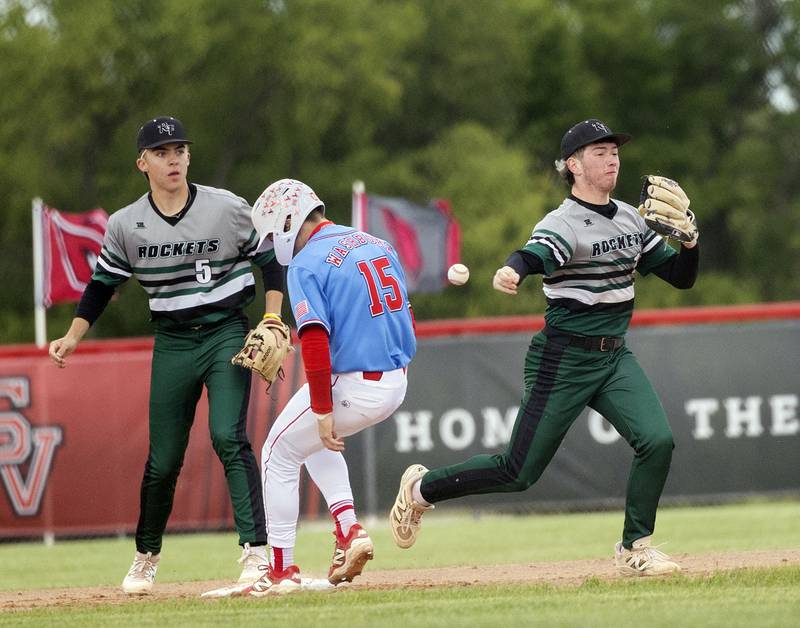 Rock Falls’ Carter Hunter loses the ball after trying to throw to first against Oregon in the Stillman Valley Class 2A Regional semifinal Thursday, May 22, 2025. Oregon’s Jack Washburn was called for interference for an inning ending double play.