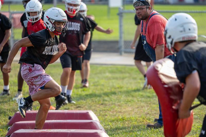 Jesus Martinez of Streator hops over hurdles during practice on Monday, August 11, 2025 at Streator High School in Streator.