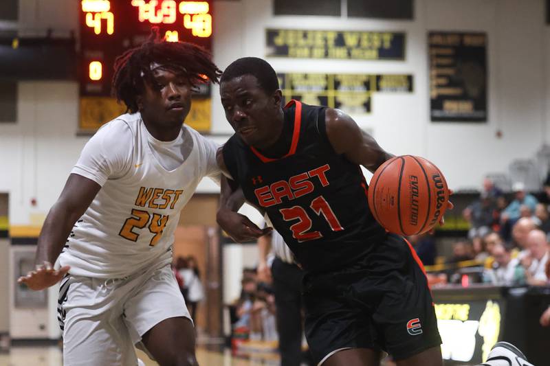 Plainfield East’s Kevin Tchoffa drives to the basket against Joliet West on Friday, Dec. 8th, 2023 in Joliet.