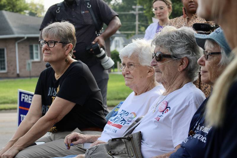 Voters listen to Gov. JB Pritzker during a campaign stop on Sunday at the Whiteside County Democratic headquarters in Rock Falls.