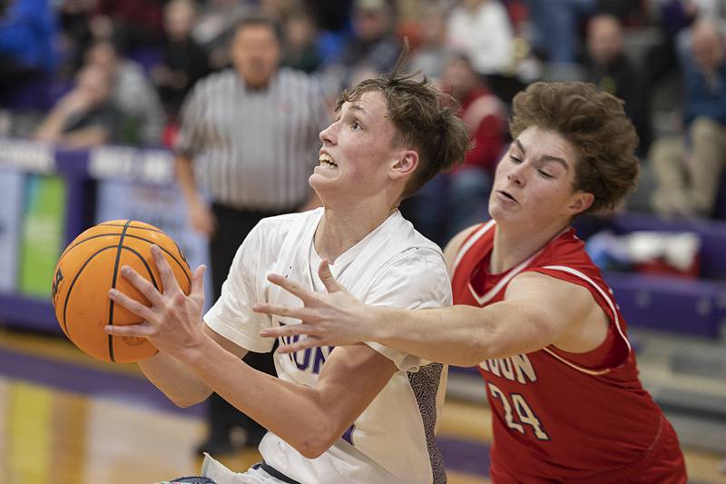 Dixon’s Beckham Rock is fouled by Oregon’s Ethan Peeling Tuesday, Feb. 3, 2026.