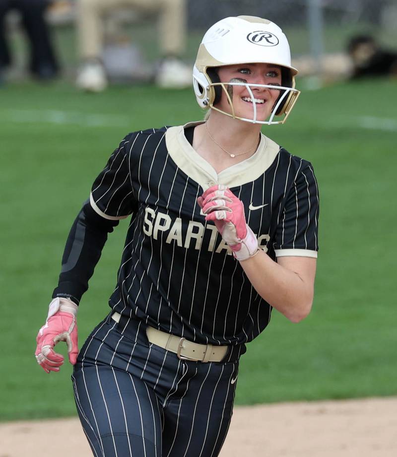 Sycamore's Faith Heil rounds second after homering Tuesday, April 22, 2025, during their game against Kaneland at Sycamore High School.
