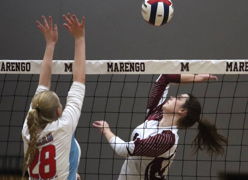Marengo’s Addison Sanchez prepares to hit the ball against Marian Central in IHSA Class 2A  Regional volleyball action on Monday, Oct. 28, 2024, at  Marengo High School  in Marengo.