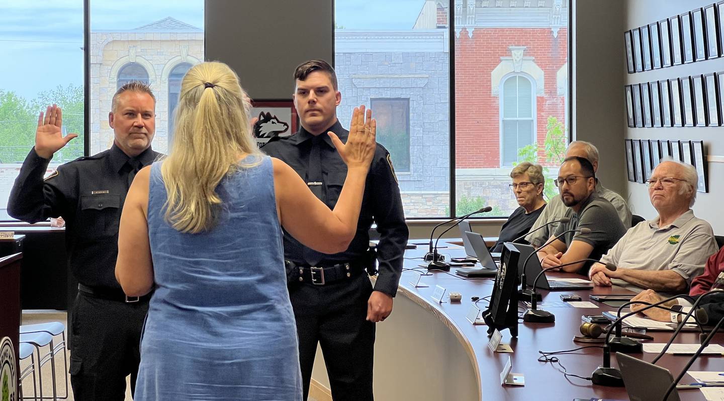 Nicholas Inden and Scott Allspaugh were sworn in as Sycamore Police Officers during a Sycamore City Council meeting on May 18, 2026, by City Clerk Mary Kalk.