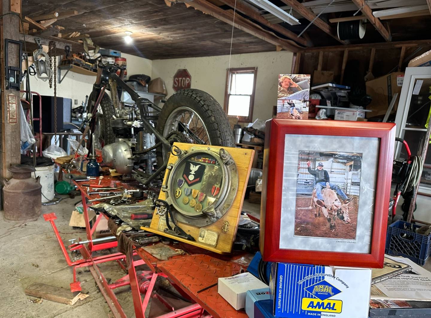 Memorial items relating to John Combs are shown in the workshop of his father, Chris Combs.
