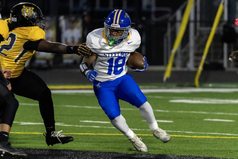 Joliet Central's Tristen Sellers makes a nice move during a varsity football game against Joliet West at Joliet West on Oct. 24, 2025.