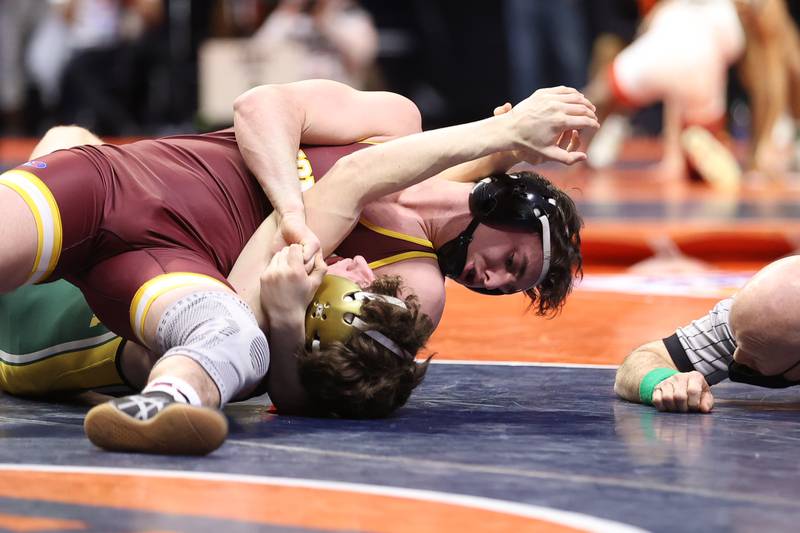 Montini’s Jayden Colon Mattoon’s looks to pin Kiefer Duncan in the Class 2A 145lb. semifinals at State Farm Center in Champaign. Friday, Feb. 18, 2022, in Champaign.