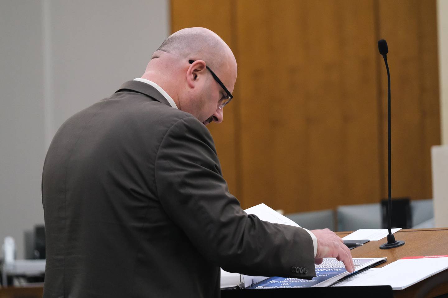 Prosecuting attorney Steven Platek goes over his notes while questioning a witness during the Jeremy Boshears trial. Boshears is charged with the murder of Kaitlyn “Katie” Kearns, 24, on Nov. 13, 2017. Monday, April 25, 2022, in Joliet.