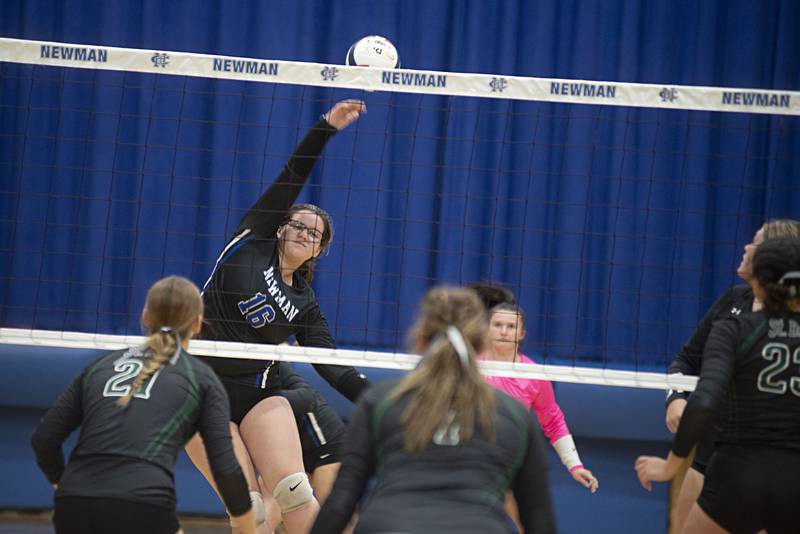 Newman’s Leah Kalina plays the ball over the net Tuesday, Sept. 27, 2022 against St. Bede.