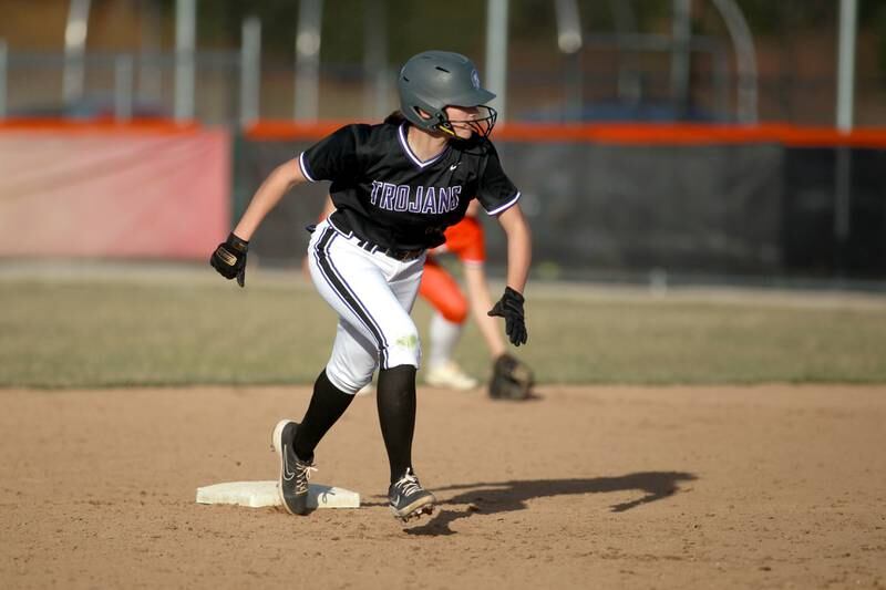 Downers Grove North's Viktoria Czech takes off from second base during a game against St. Charles East on Friday, March 28, 2025 in St. Charles.