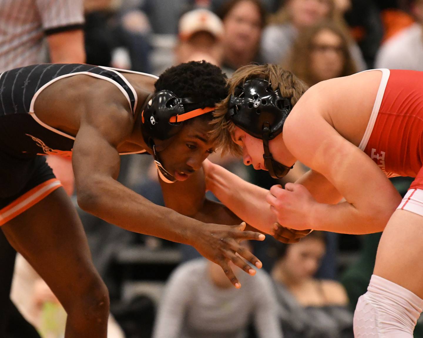Nathan Craft of Yorkville wrestles against Jalen Airhart of DeKalb in the 120 weight class on Friday Dec. 30th during The Don Flavin wrestling Invite held at DeKalb High School.