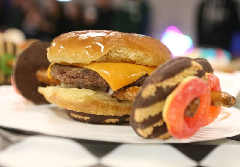 A cheeseburger car built by Ottawa Township High School students was on display before racing during the 18th annual Editable Car Contest on Wednesday, Feb. 28, 2024 at Illinois Valley Community College in Oglesby.