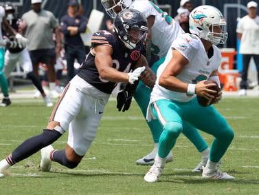 Chicago Bears place Austin Booker on IR, bring back Devin Duvernay, Scott Daly