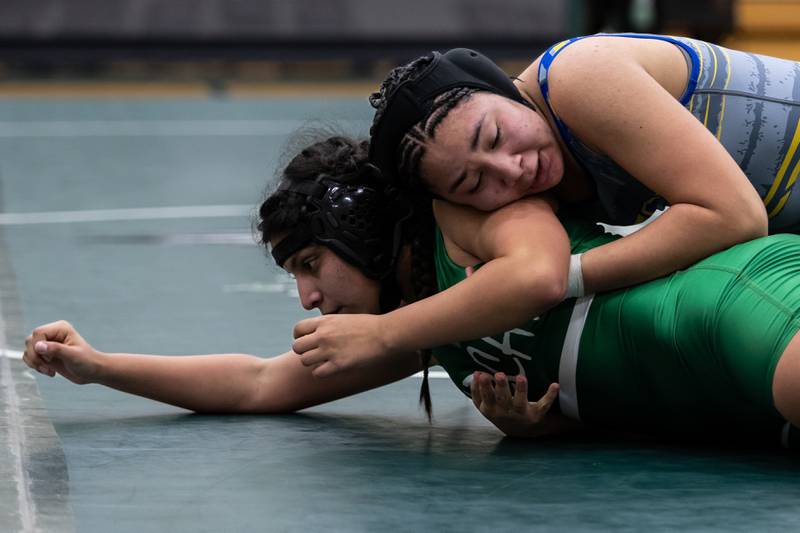 Joliet Central's Nadya McCottrall takes on Aaliyah Banda of Plainfield Central in the 140-pound match at Plainfield Central on January 13, 2025.