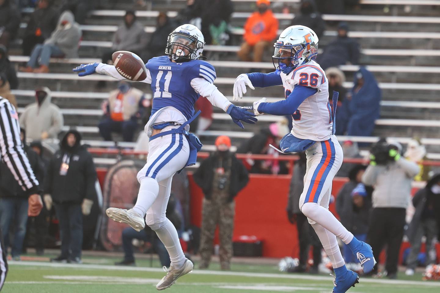 Geneva’s Will Pascoli has his pass broken up by East St. Louis’ Raheem Floyd in the Class 6A state championship on Saturday, Nov. 30, 2024 in Normal.