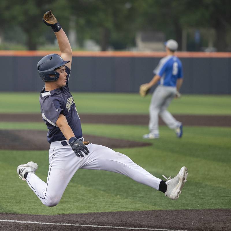 Teutopolis’ Davin Worman scores the first run of the game against Newman Friday, June 6, 2025, during the Class 2A state semifinal at Illinois Field in Champaign.
