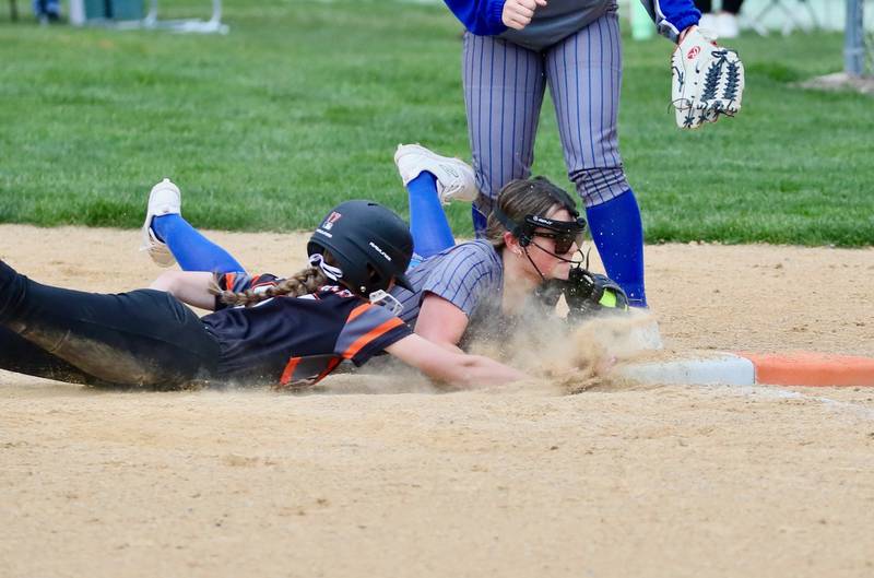 Princeton second baseman Sylvie Rutledge doubles off Kewanee's Abby Gerard off first base after catching a line drive in the second inning in Thursday's game at Little Siberia. Kewanee won the game 6-2.