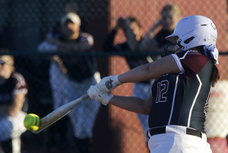 Marengo's Mia Miceli hits the ball during a nonconference softball game on Monday, March 9, 2026, at Marengo High School.