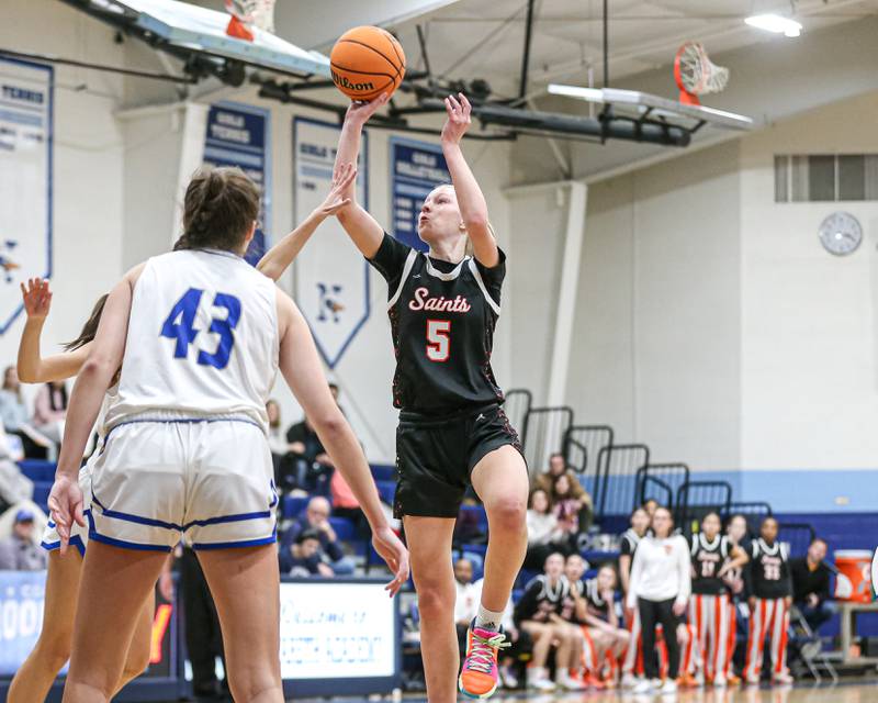 Saint Charles East's Brooklyn Schilb (5) puts up a shot during their Coach Kipp's Hoopfest basketball game between Lyons at St Charles East. Jan 18, 2025 in La Grange.
