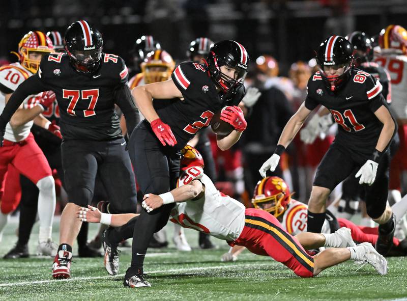 Lincoln-Way Central's Robert Tingley (2) runs the ball during the Class 7A semifinal playoff game against Batavia on Saturday, Nov 23, 2024 at New Lenox. (Dean Reid for Shaw Local News)