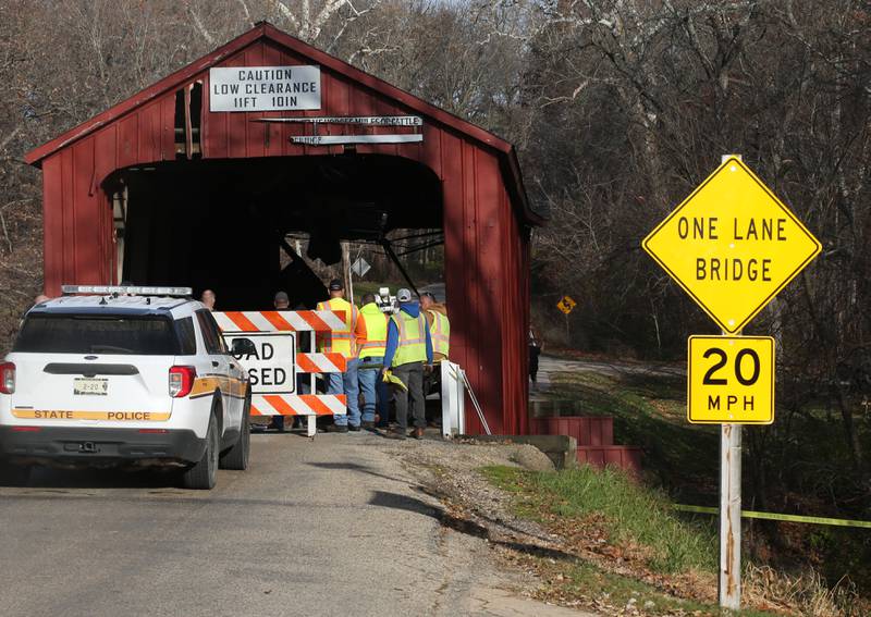 A view of the damage looking north at the Red Covered Bridge on Thursday, Nov. 16, 2023 in Princeton. Illinois Department of Transportation, Illinois State Police and Bureau County law enforcement surveyed the damage bridge after it was struck by a semi-truck.