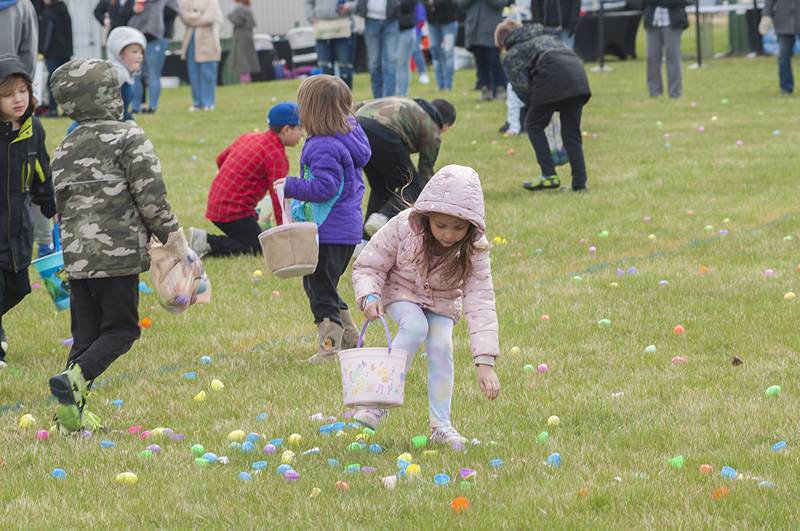 A few of the eggs popped open from the crash landing. Kids scooped up the sweet innards an moved on.
