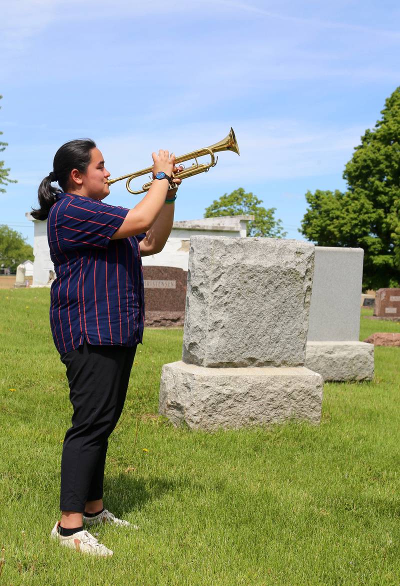 Clara Dripps Paulson plays taps at the Elburn American Legion Annual Memorial Day Observance at the Blackberry Township Cemetery on Monday, May 26, 2025.