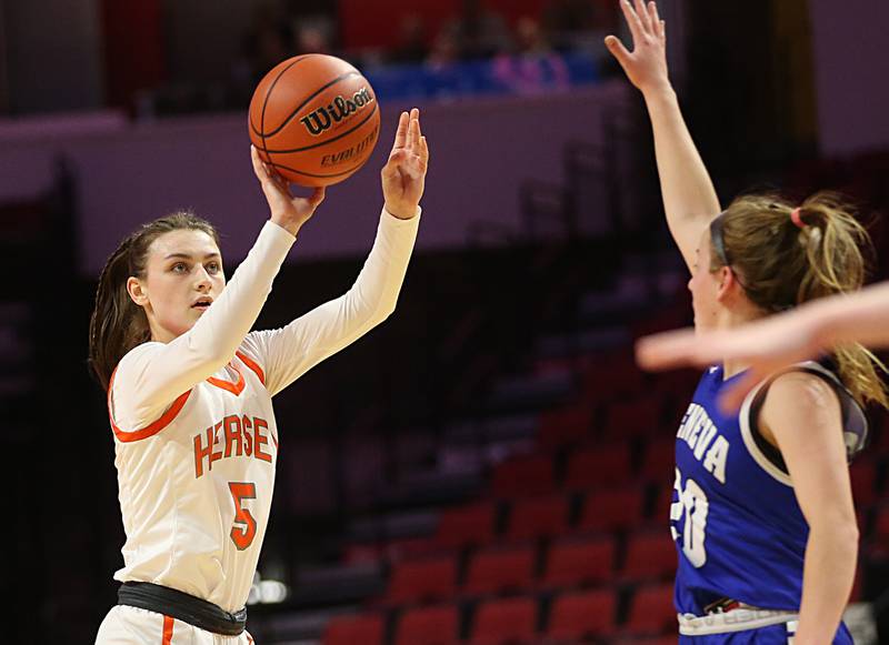 Hersey's Katy Eidle shoots a jump shot over Geneva's Caroline Madden during the Class 4A third place game on Friday, March 3, 2023 at CEFCU Arena in Normal.