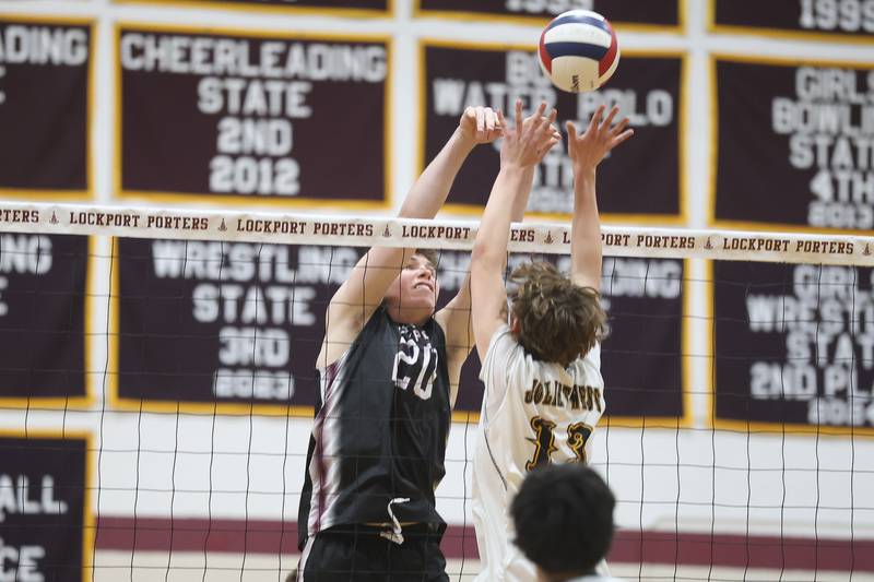 Lockport’s Noah Bluhm wins the battle at the net against Joliet West on Tuesday, March 31, 2026 in Joliet.