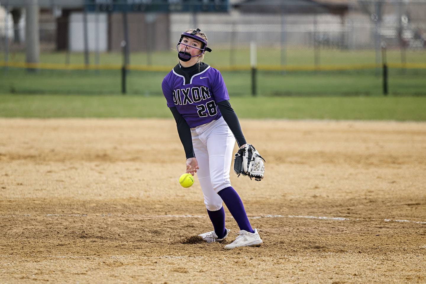 Dixon’s Allie Abell fires a pitch Wednesday, April 5, 2023 against Oregon.