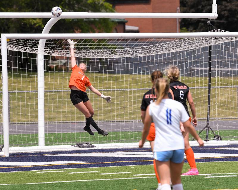 St. Charles East goal keeper Sidney Lazenby (1) makes sure the ball doesn’t go in during the start of the second half of the sectional title game Saturday May 27th while taking on St. Charles North at West Chicago Community High School.