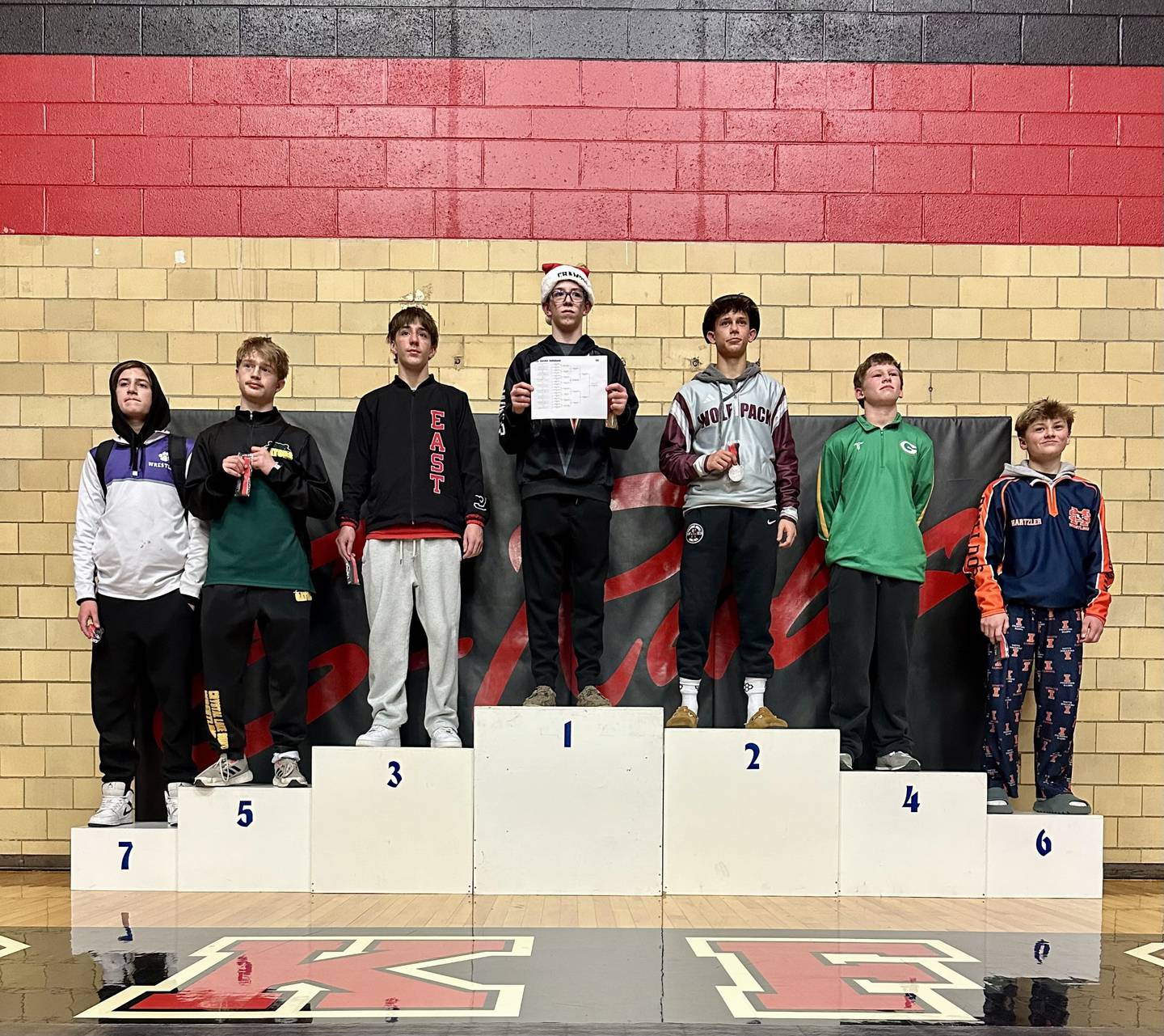Hampshire's Luthor Rajcevich, Crystal Lake South's C.J. Talbert and Prairie Ridge's Tymen Robinson (left to right) medaled in seventh, fifth and second, respectively, at the E-Rab Giardini Invitational at Rockford East on Saturday.